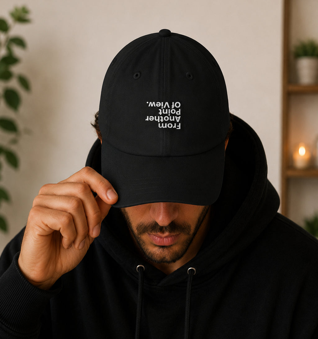 man wearing Another Point Of View Hat in black